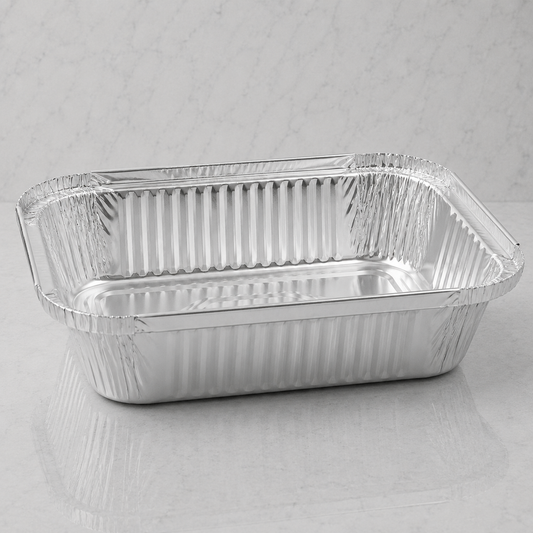 Aluminum foil food container on a gray background