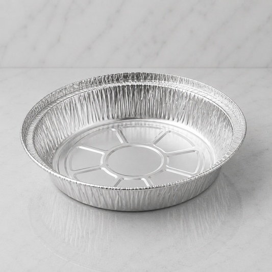 7 inch Aluminum foil pie plate on a gray background
