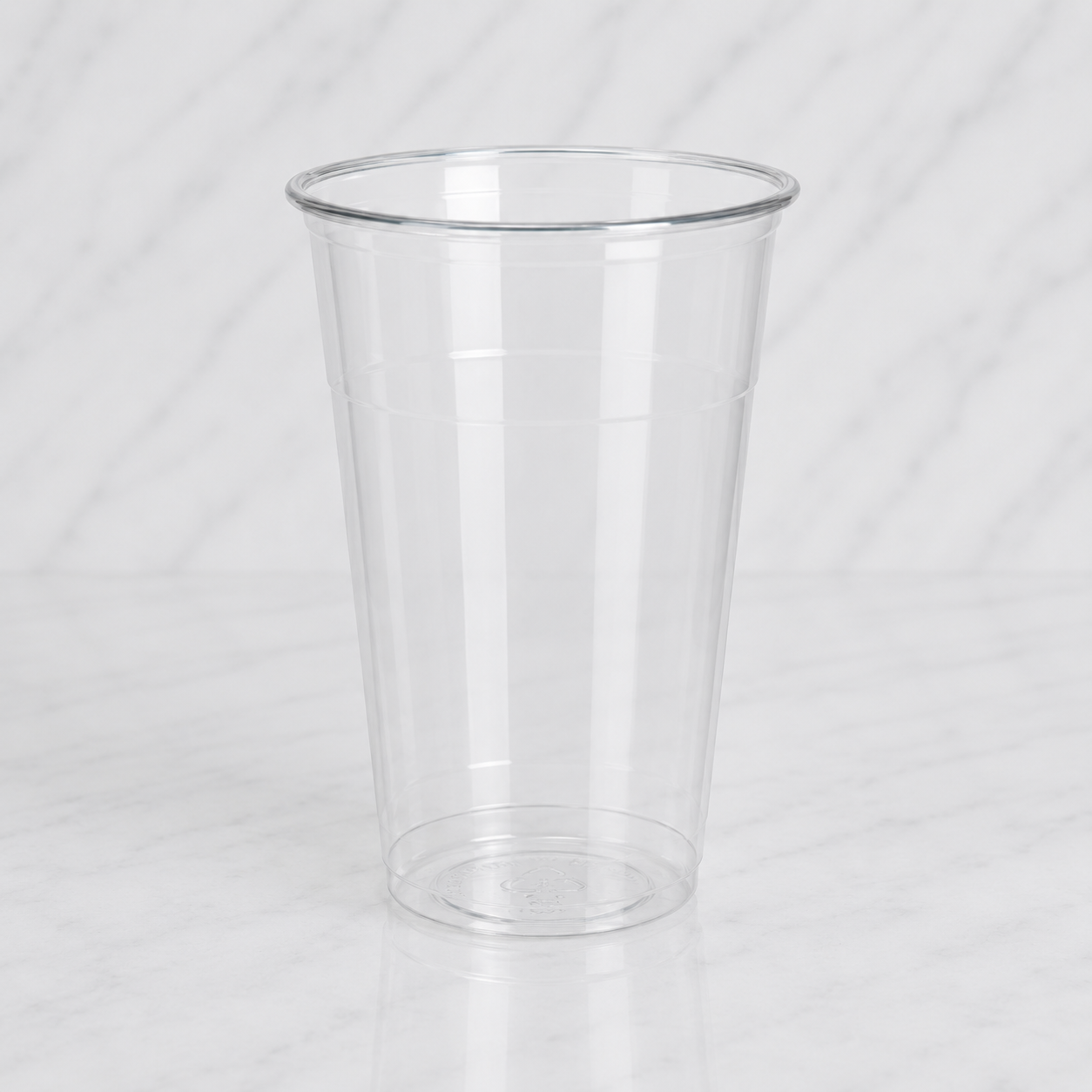 Clear plastic cup on a white background