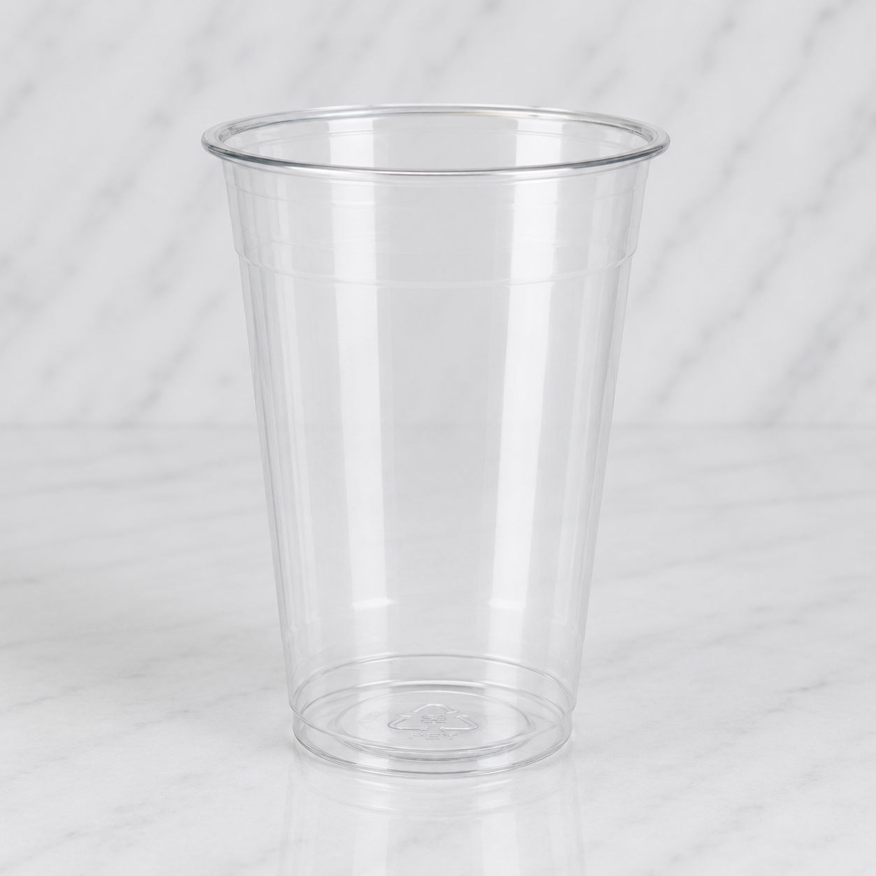 Clear plastic cup on a white background
