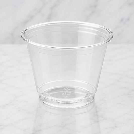 Clear plastic cup on a light gray background
