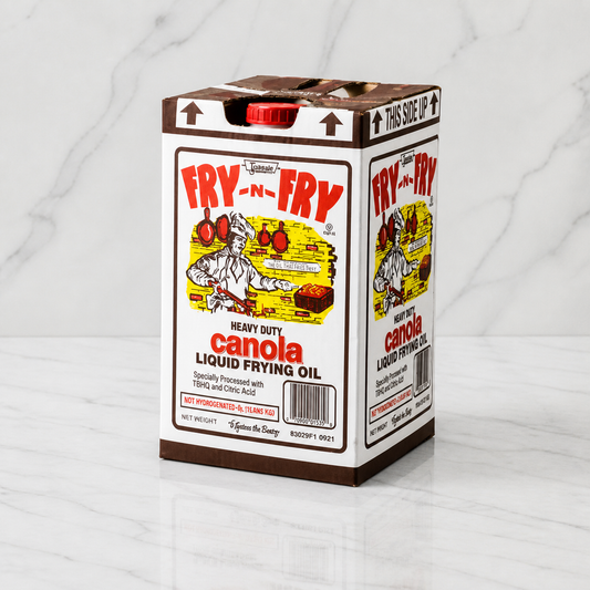 Box of Fry-N-Fry canola oil on a marble surface