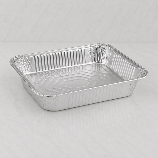 Aluminum foil pan on a gray background
